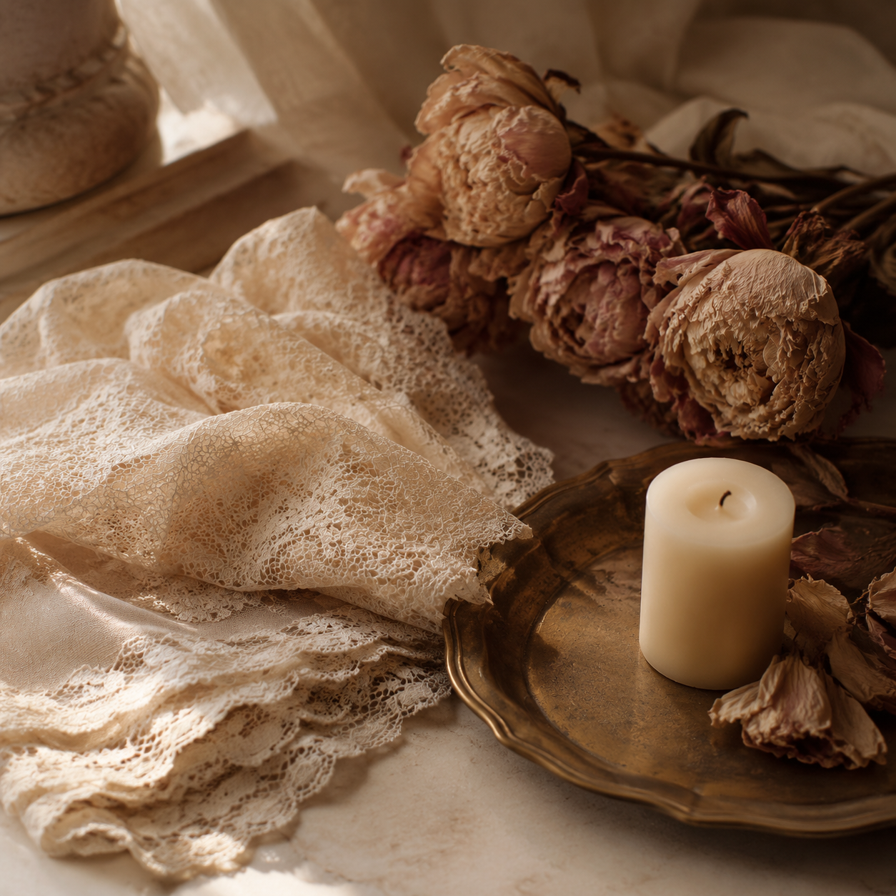 Lace, brass and candlelight detail